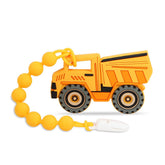 Cuebo dump-truck teether shows soft silicone texture for soothing gums.