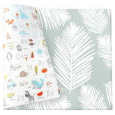 Cushmat Alpha Palm Gray play mat rolled for easy storage and space-saving setup.