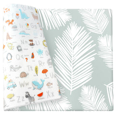 Cushmat Alpha Palm Gray play mat rolled for easy storage and space-saving setup.