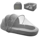 Cutebeams travel bed with canopy open for safe on-the-go naps.