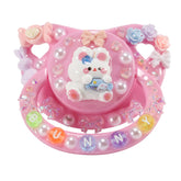 CutiePlusU adult pacifier bunny-pink close-up showing soft silicone teat for soothing comfort.