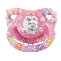CutiePlusU adult pacifier bunny-pink close-up showing soft silicone teat for soothing comfort.