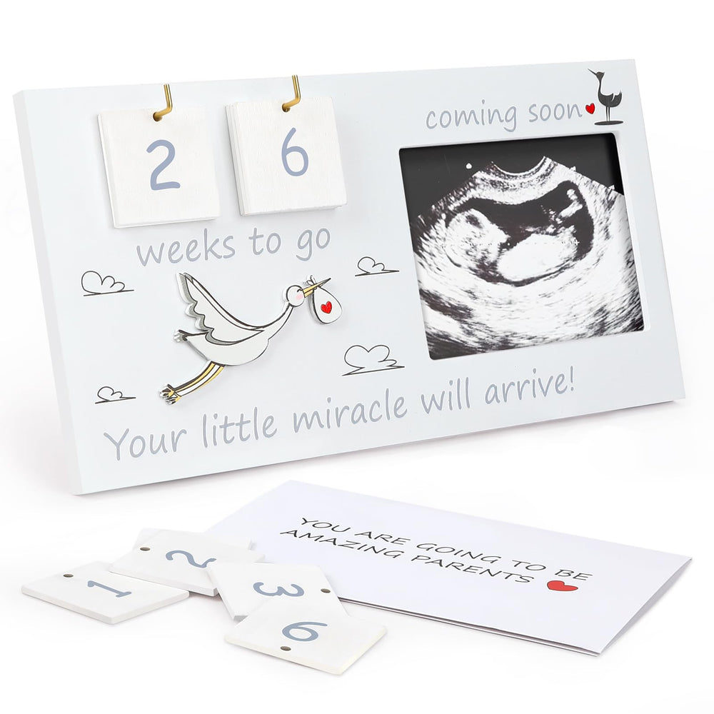 CypherX baby-sonogram-frame-full-display shows a 4x3 photo in the wood frame for cherished memories.