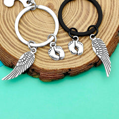 Dabihu baby memorial keychain close-up highlights the high-polish finish for a timeless tribute.