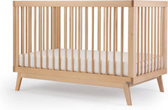 Dadada Soho natural beechwood crib with warm grain and durable finish.