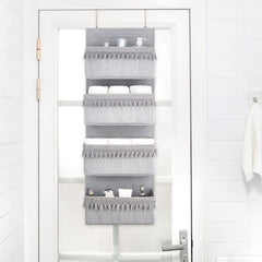 Dahey four-pocket organizer on door helps organize cosmetics and toiletries.
