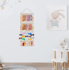 Dahey macrame bow organizer with wooden sticks showcases hair accessories neatly.