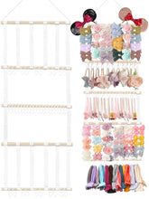 Danightime bow holder mounted on wall showcasing organized storage for bows.