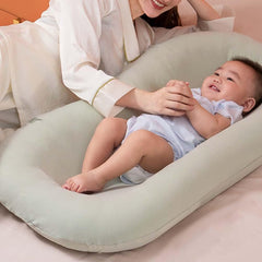 DAOLUAN baby lounger bionic design demonstrates safe space for awake baby to play.