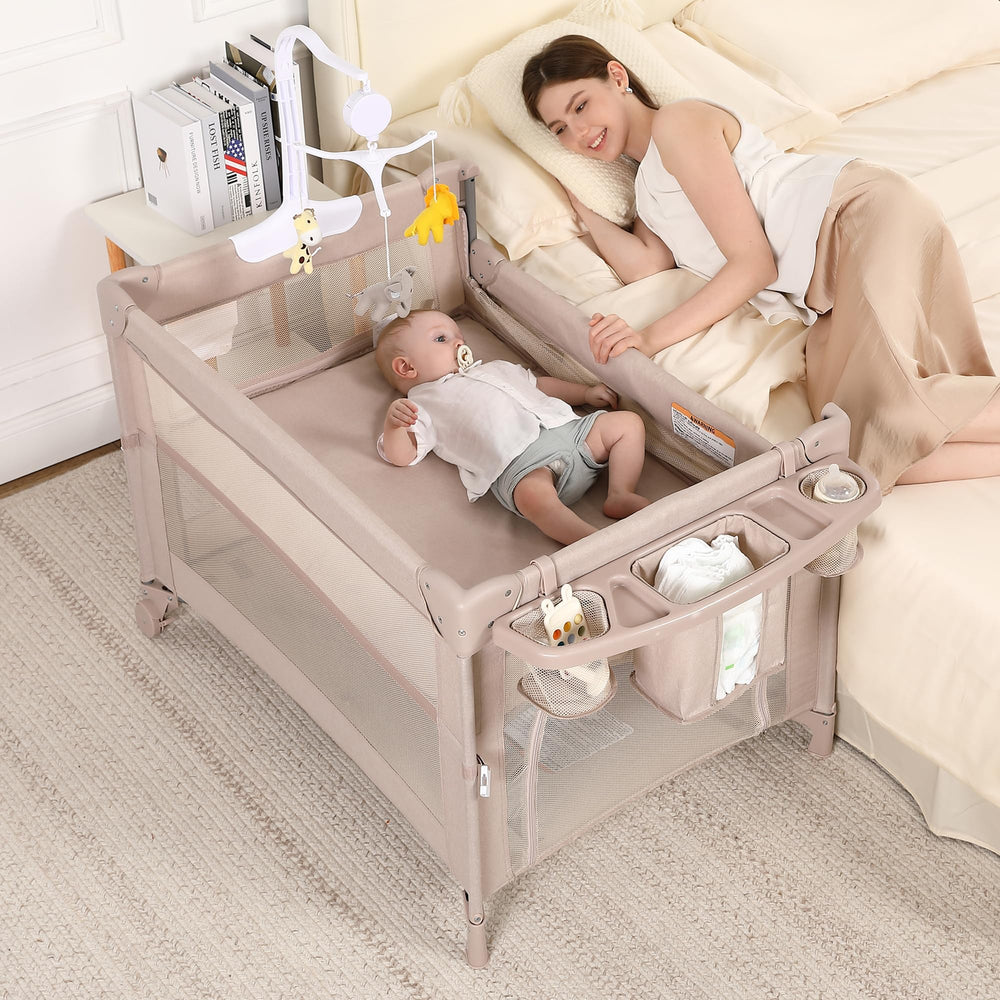 Dapue Pack and Play 5-in-1 beige setup showing compact travel-ready crib and playpen