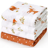 David's Kids forest animals swaddle blanket offers cozy security for newborn sleep.