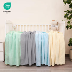 David's Kids muslin swaddle blanket close-up highlights 47x47 inch size for growing babies.