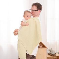David's Kids muslin swaddle blanket texture close-up shows breathable cotton for comfy sleep.