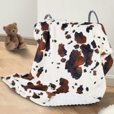 DCOOLGO cow baby blanket in soft fleece provides gentle cozy comfort.