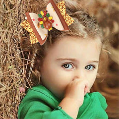 DDNFO turkey hair clip for baby girls offers lightweight comfort at parties.