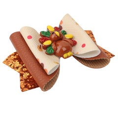 DDNFO turkey barrettes brighten holiday ensembles for baby girls.