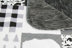 Dear Baby Gear Bears Deluxe Blanket moose motif offers cozy travel comfort.