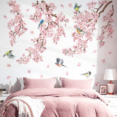DecalMile cherry blossom tree branch wall decal creates a soft focal point in a bedroom