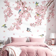 DecalMile cherry blossom tree branch wall decal creates a soft focal point in a bedroom