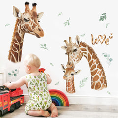 Decalmile giraffe family wall decal in living room setting enhances sofa backdrop
