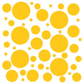 DecalVenue 100 yellow polka dot wall decals on wall, removable without residue for nursery decor.