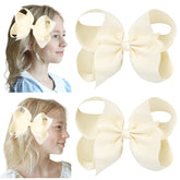 DEEKA 6in handmade ivory hair bow with secure alligator clip for stylish updos.
