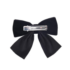 DEEKA alligator clip hair accessory black demonstrates secure hold for active kids