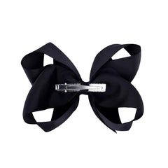 DEEKA closeup of the alligator-clip bow shows sturdy attachment and soft texture.