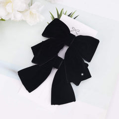 DEEKA baby girl velvet bow fashion accessory in black for parties or school