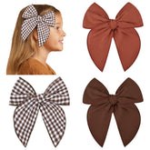 DEEKA Christmas Fable bow in brown gingham with secure clip for easy styling