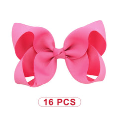 DEEKA ponytail look with hot pink bow for quick chic styling.