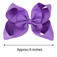 DEEKA set of two bows purple worn on hair for versatile school looks.