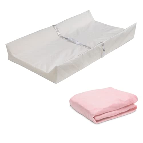 Delta Children contoured changing pad with pink cover offers a soft, safe baby changing surface.