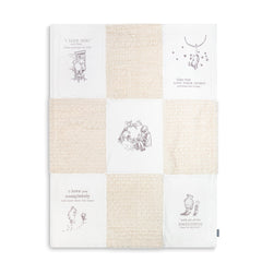 DEMDACO Pooh Classic Yellow Bear blanket folded for easy, cozy on-the-go comfort.