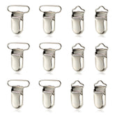 Demearly pacifier clip metal fasteners closeup showing secure grip on fabrics