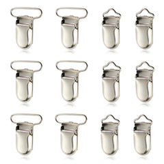 Demearly pacifier clip metal fasteners closeup showing secure grip on fabrics