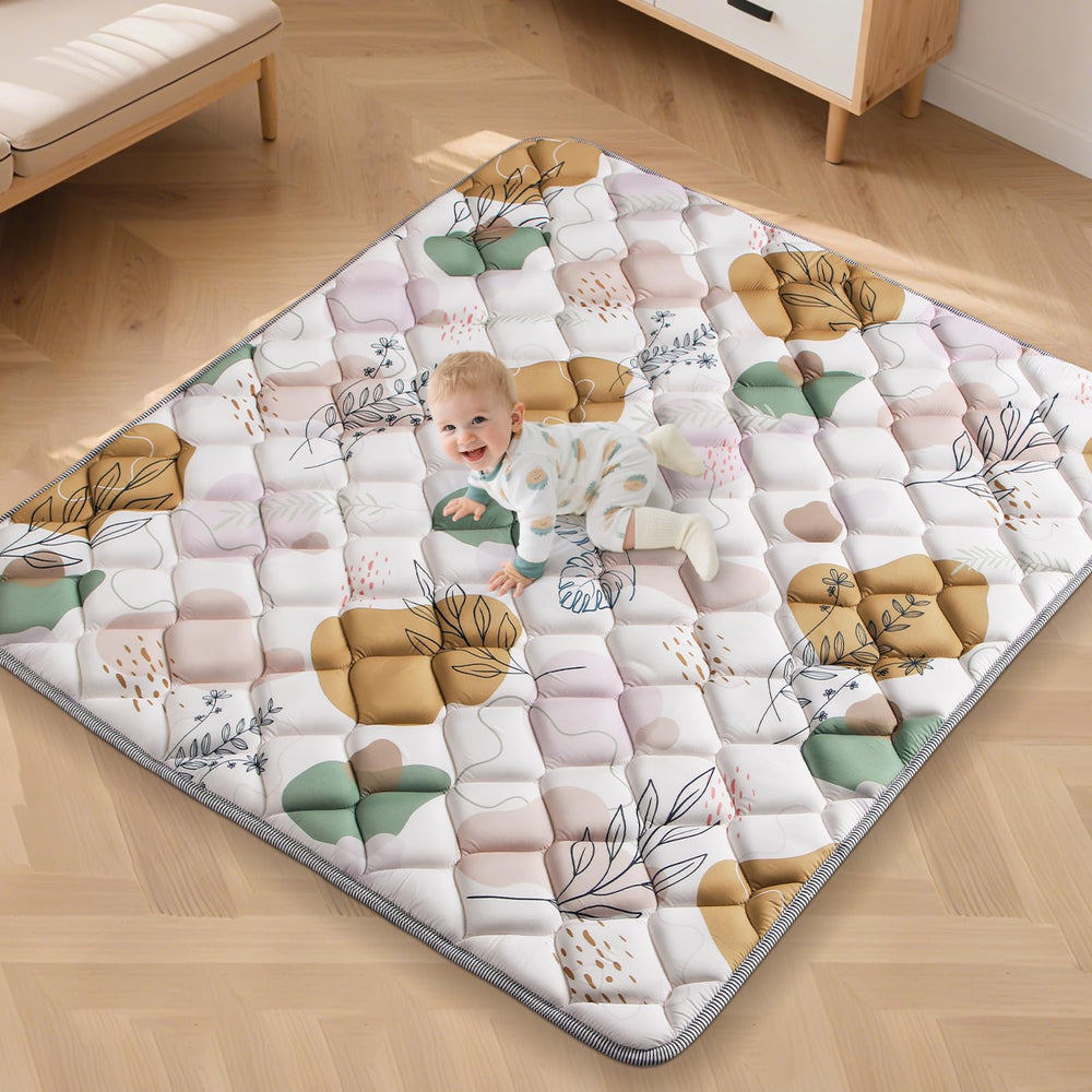 Dessports 65x50in baby play mat folded for travel and storage.