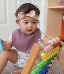 Diaper Squad baby bib set highlights triple-layer absorbency and durable everyday wear.