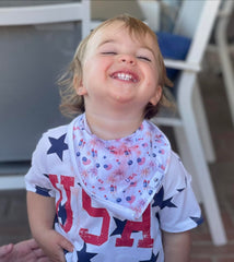 Diaper Squad bandana bib designs pair with outfits for everyday style.