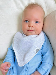 Diaper Squad bib double-layer fabric enhances absorption for heavy drool days.