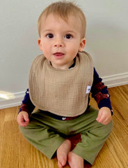 Diaper Squad adjustable bibs with three snaps fit 2โ36 months.