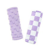 DILIMI baby belt cover in purple checkered fabric provides soft protection for face and shoulders.