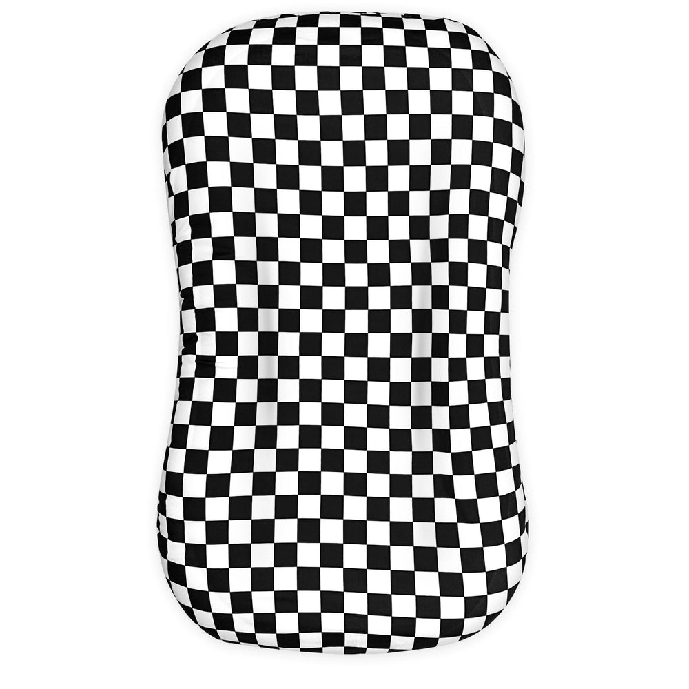 DILIMI baby lounger cover in black checkerboard closeup; soft, breathable fabric for newborn comfort.