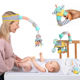 Dingle Dangle Deluxe Gift Set headband in use helps calm wriggly babies during diaper changes.