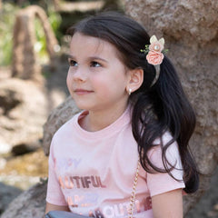 Dizila rhinestone-detail flower hair tie adds subtle sparkle for playdates.