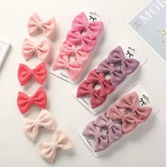 Dnett Designs baby girl waffle bow closeup shows soft cotton texture.
