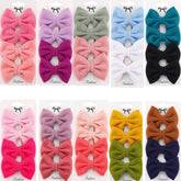 Dnett Designs waffle bow 3in with alligator clip provides secure daily wear.