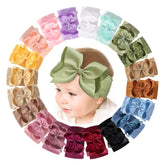 Doboi baby bows headband in soft nylon for gentle everyday fit