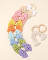 Doboi headbands with adjustable stretch fit newborns to toddlers.