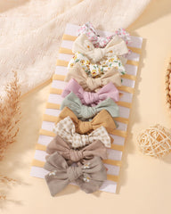 Doboi nylon headband nude color pairs with any bow for seamless everyday wear.